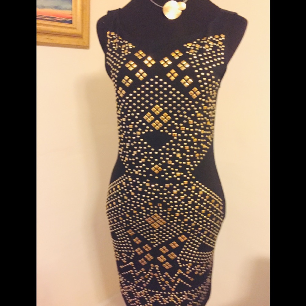 SOLD.   Gold embellished dress